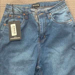 Shape mid wash high waist skinny jeans- US 8.